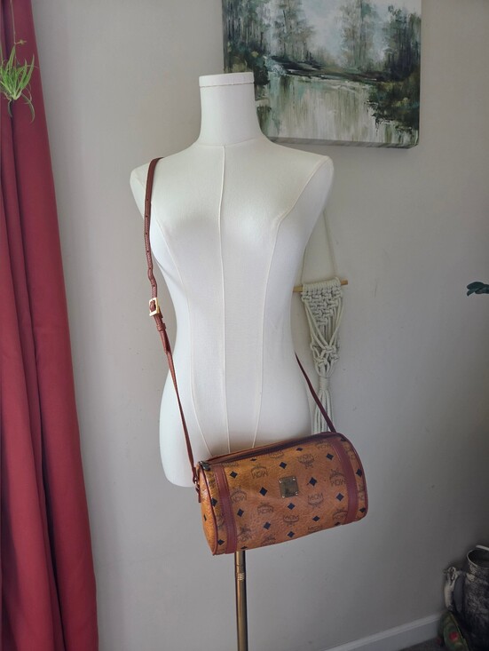MCM Handbags - MCM Cognac Monogram Barrel Crossbody Bag